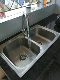 Painting, plumbing, tiling, paving, lawn installation, tarring and paving