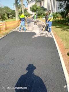 Tarring, paving, retaining walls and concrete works