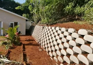 Tarring, paving, retaining walls and concrete works