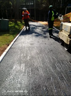 Tarring, paving, retaining walls and concrete works