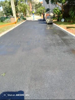 Tarring, paving, retaining walls and concrete works