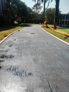 Tarring, paving, retaining walls and concrete works