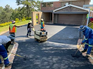 Tar surfacing, paving,retaining walls and concrete