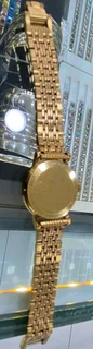 Titanium Tisso watch and a pure gold Tisso watch
