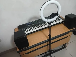 Casio keyboard HT-3000, ring lighter, monitor two speakers