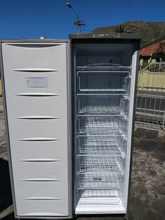 Defy upright freezer delivery optional