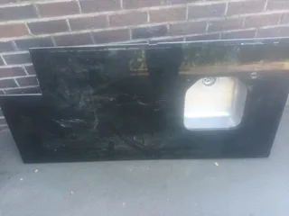 Granite top S/ S sink fitted