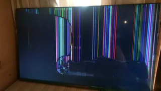 60 inch skyworth Google TV with a broken screen with original remote controller