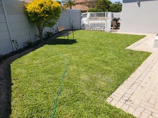 Paving And Roll On Lawn Installation