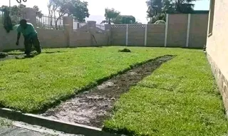 Paving And Roll On Lawn Installation