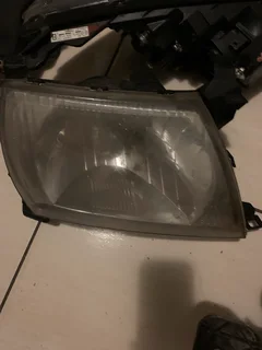 left headlight for a Mitsubishi Space Runner