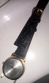 A Woman's Watch with One Quartz  Diamond inside