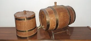Matching real oak wine barrel and ice bucket with brass trim. All in very good condition.