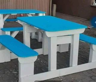 Beautiful wooden benches with tables