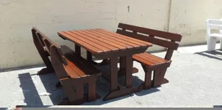 Beautiful wooden benches with tables