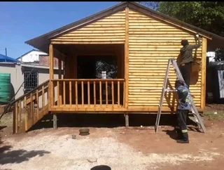 Kau  Phillip log homes