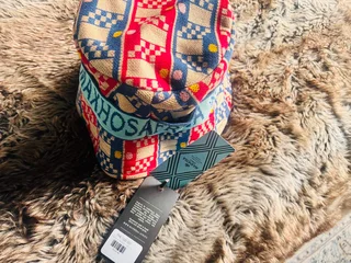 Brand new Maxhosa bucket hat with price tag