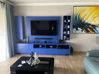 Royal blue TV stand and side pedestals