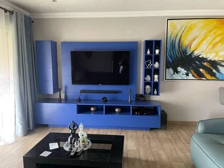Royal blue TV stand and side pedestals