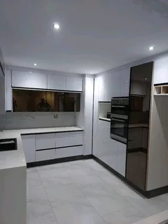 Built in kitchen cupboards and fitted wardrobes