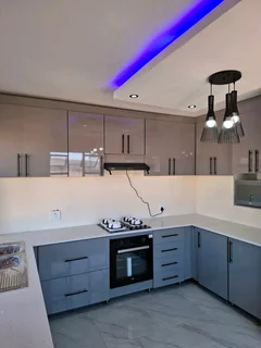 Built in kitchen cupboards and fitted wardrobes