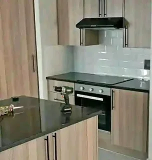 Built in kitchen cupboards and fitted wardrobes