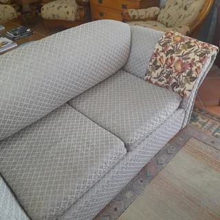 Beautifully designed two-seater couch.