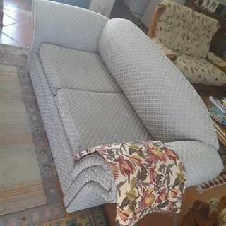 Beautifully designed two-seater couch.