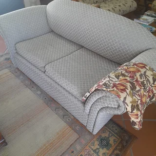 Beautifully designed two-seater couch.