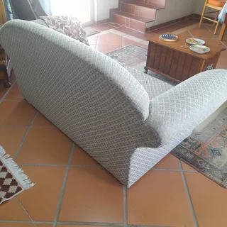 Beautifully designed two-seater couch.