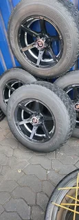 BAKKIE 17&#34;MAG RIMS AND 265/65/17 BRIDGESTONE TYRES