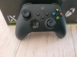 Xbox Series X with 2 Controllers and 4 games