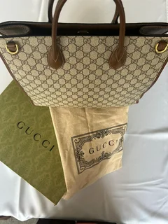 Gucci GG Supreme canvas and leather tote bag with gold-toned hardware