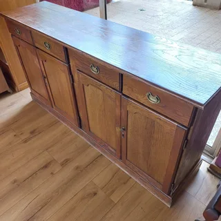 Side Board Oak 4 Drawer And 4 Door - Used