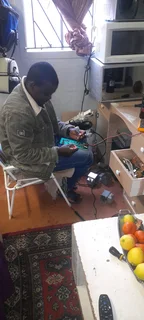 Malawi man I&#39;m doing to fixing pools, microwave