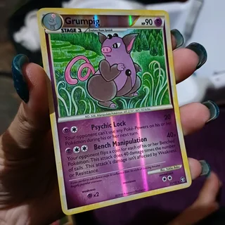 Reverse Holo Grumpig from the Pokémon TCG Triumphant expansion, card number 23/102 Shiny