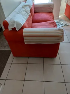 Couch 2 setter size 179 cm in length 40 years old SOLID needs a clean orange R2,200k neg Rugby area