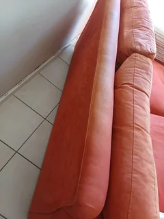 Couch 2 setter size 179 cm in length 40 years old SOLID needs a clean orange R2,200k neg Rugby area