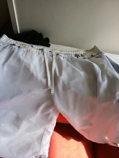 Gents shorts long length white elasticated at the waist one cream with draw string Rneg