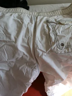 Gents shorts long length white elasticated at the waist one cream with draw string Rneg