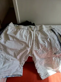 Gents shorts long length white elasticated at the waist one cream with draw string Rneg