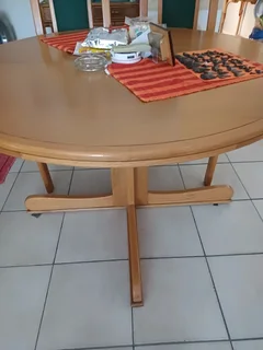 Round dining table with four chairs yellow wood