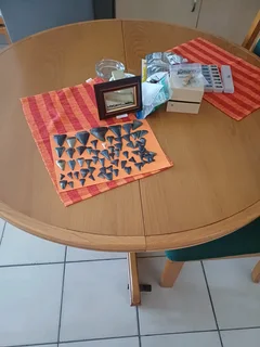 Round dining table with four chairs yellow wood