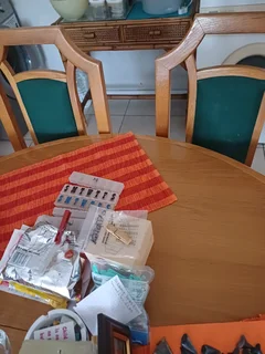 Round dining table with four chairs yellow wood