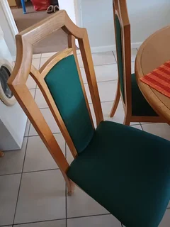 Round dining table with four chairs yellow wood