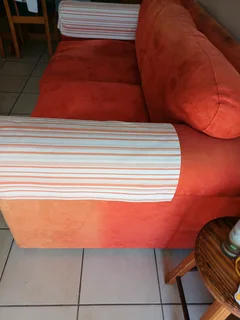 Cottage two seater couch Solid more than 40 years old  material needs a clean R1,4 k neg