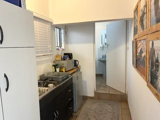 An outside building with 2 offices, one for rent. Own entrance but shared kitchen and bathroom R6000