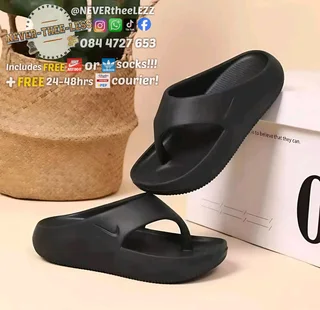 Nike calm flip flops