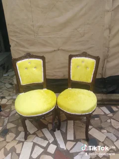 2 wooden yellow chair