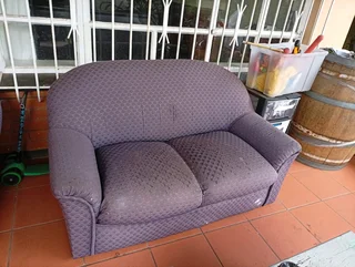 Blue couch set, two two seaters and a single seater, R500.